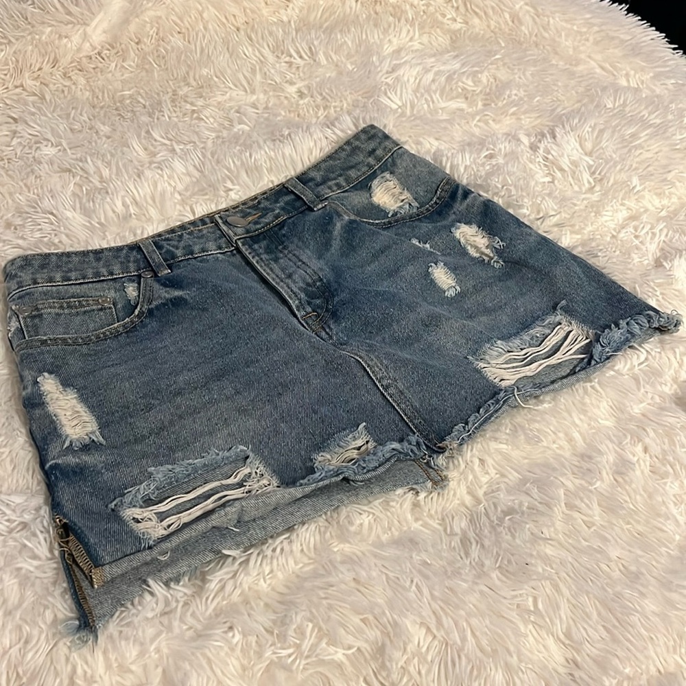 Distressed denim mini skirt size 6